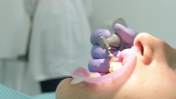 Patient during a dental treatment alt