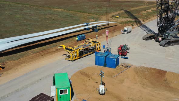 Wind Turbine Construction Site, Massive Blades on the Side of the Road,  alt