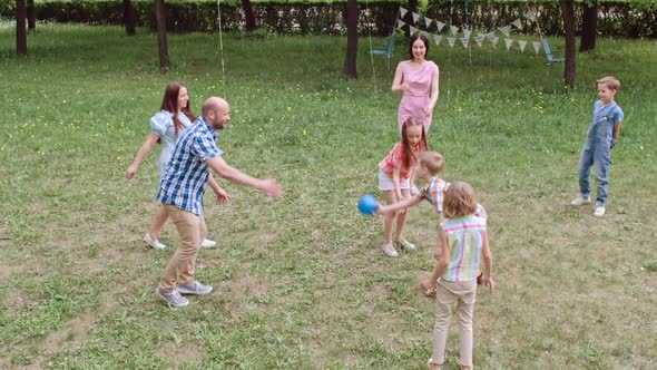 Children Playing Together at Birthday Party in Park alt