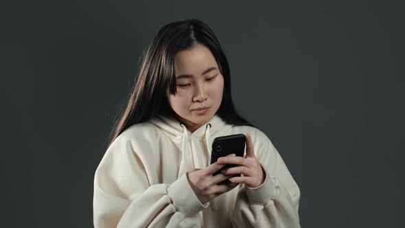 Asian Girl Sms Texting, Using App on Smartphone. Pretty Woman Surfing Internet alt