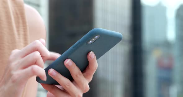 Woman use of mobile phone alt