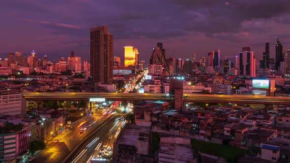 Bangkok business district city center and expressway during twilight, day to night - Time Lapse