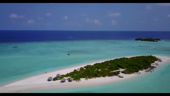 Aerial flying over tourism of perfect island beach time by aqua blue sea with white sandy background alt