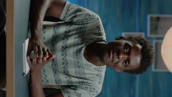 Vertical Video POV of Entrepreneur Using Video Call Communication alt