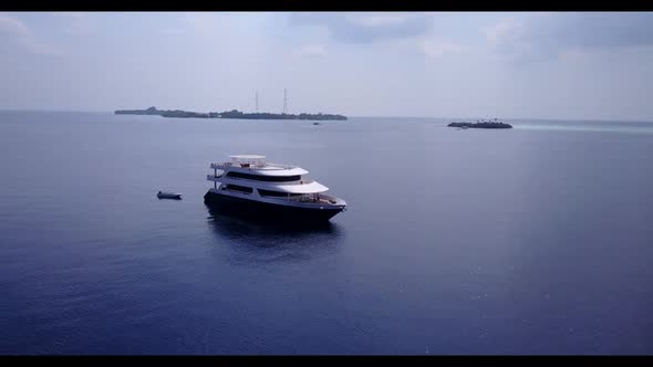 Aerial top down landscape of paradise lagoon beach voyage by aqua blue lagoon with white sandy backg alt