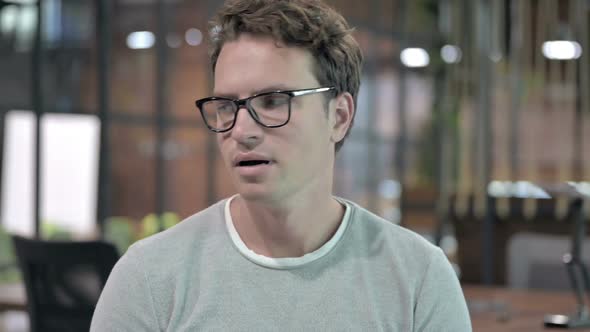 Portrait Shoot of Sleepy Young Guy Having Yawing alt
