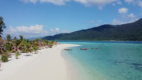 Aerial Top View on Beautiful Blue Ocean Beach with White Sand and Palms alt