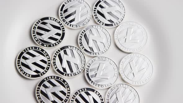 Rotating shot of Litecoin Bitcoins (digital cryptocurrency) - BITCOIN LITECOIN 0085 alt
