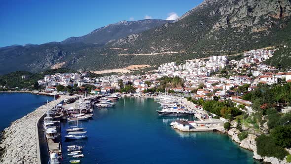 The top view from the drone of Kas resorts, bay, yahts, city in Mugla in Turkey