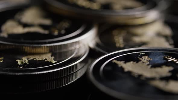 Rotating shot of Bitcoins  alt