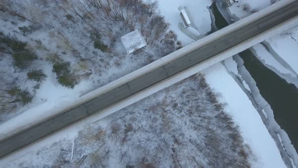 Car On The Winter Road Bridge