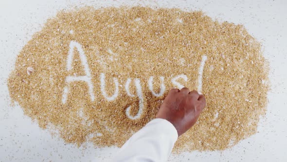 Hand Writes On Sand August 