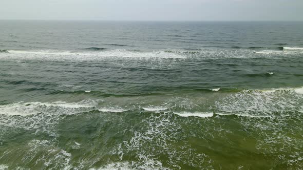 Fly Over On Deep Green Ocean Water With Big Splashing Waves In Wladyslawowo, Poland. - Aerial Drone alt