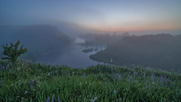 Timelapse of Summer Foggy River Night to Sunrise Transition alt