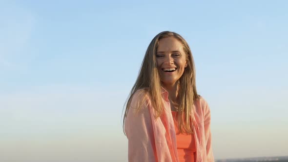 Attractive Blonde Lady Laughing on Sky Background, Having Fun in Summer Sun