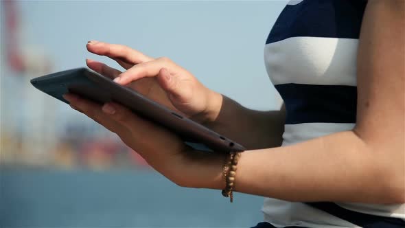 Hand Touching Tablet alt