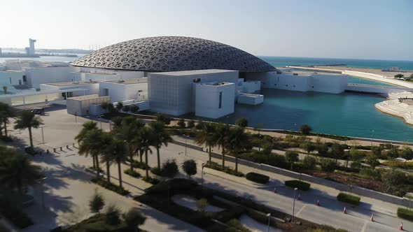 Aerial view of Louvre museum in Abu Dhabi, United Arab Emirates. alt