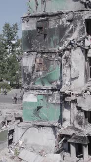 Vertical Video of a Destroyed Residential Building in Ukraine During the War alt