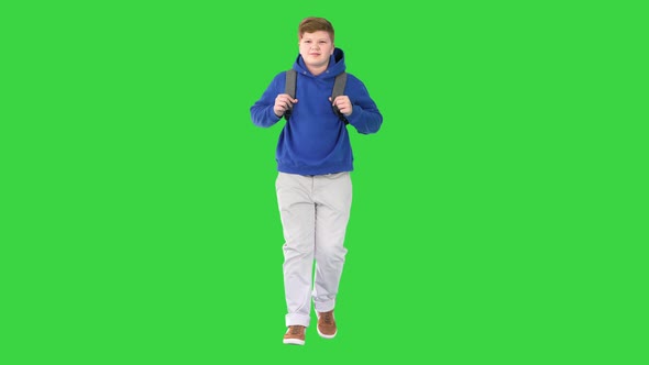 Male Student with a Backpack Walking on a Green Screen Chroma Key alt