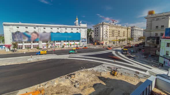Workers Operating Asphalt Paver Machines During Road Construction and Repairing Works Timelapse alt
