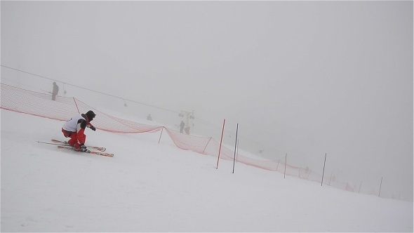 Skiers Riding On Slope 2