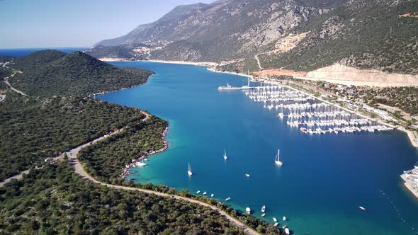 The top view from the drone of Kas resorts, bay, yahts, city in Mugla in Turkey alt