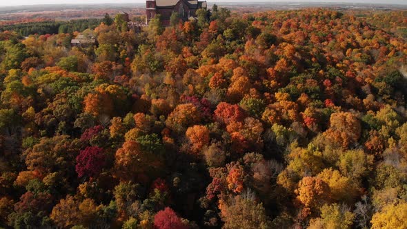 Aerial Drone Holy Hill Basilica Wisconsin with Fall Colored Trees in Forest