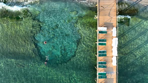 Texture of the rocky beach aerial view 4 K Turkey Alanya alt