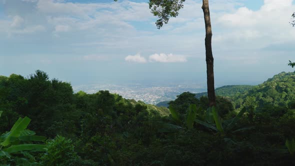 4K Cinematic landscape footage of the city of Chiang Mai, North Thailand from the top of Doi Pui on alt