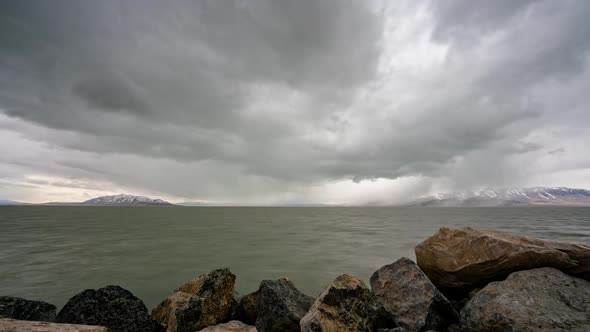 Spring rain storm moving over Utah Lake bringing cold weather alt