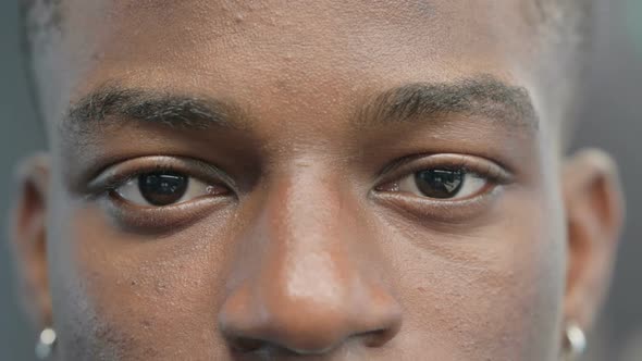 Blinking Eyes of Young African American Man alt