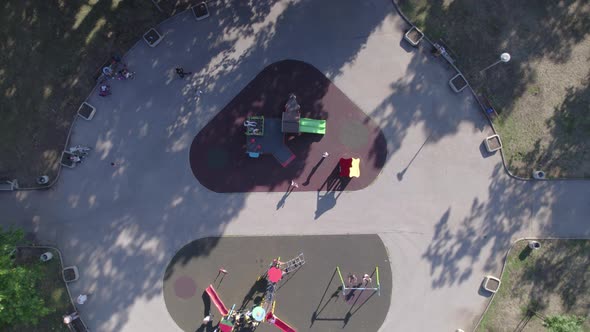 Drone Top View of Playground in Park alt