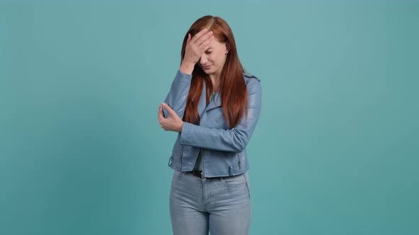 Portrait of Annoyed Girl Making Face Palm Gesture, Feeling Bored. alt