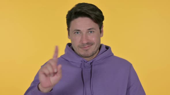 Man No Sign By Finger Yellow Background alt