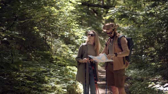 Hiking In Forest. Camping Tourism Trekking Summer Wood. Walk Journey Hike In Jungle. alt