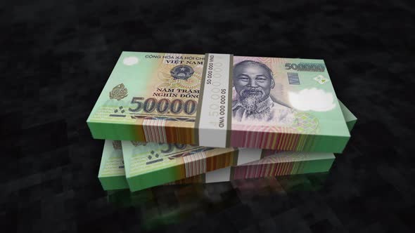 Vietnam Dong money banknote pile packs alt