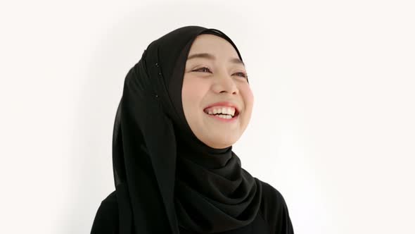 Portrait of a Young Asian Muslim Woman  alt