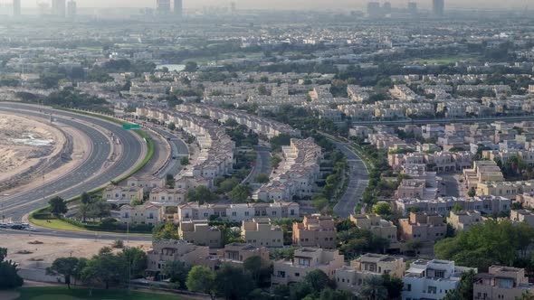 Aerial View to Villas and Houses with Golf Course with Green Lawn and Lakes Timelapse alt