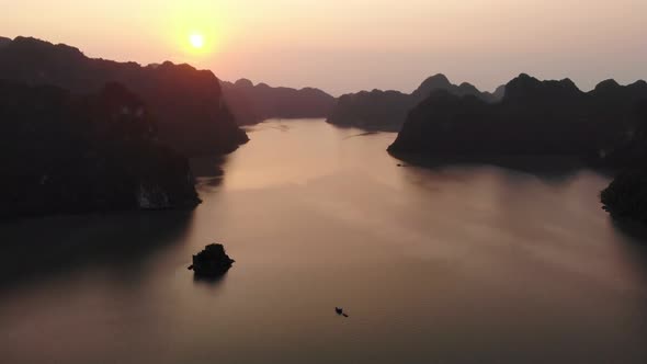 Aerial: unique flying over Ha Long Bay and Cat Ba island, Vietnam alt