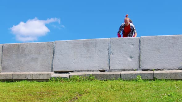 A Young Man Doing Parkour in the City alt