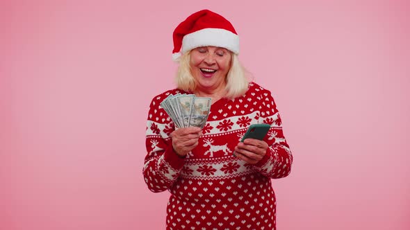Christmas Grandmother Looking Smartphone Sincerely Rejoicing Win Success Luck Receiving Money Online alt
