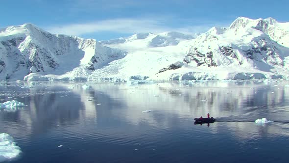 Antarctic landscape with small boat