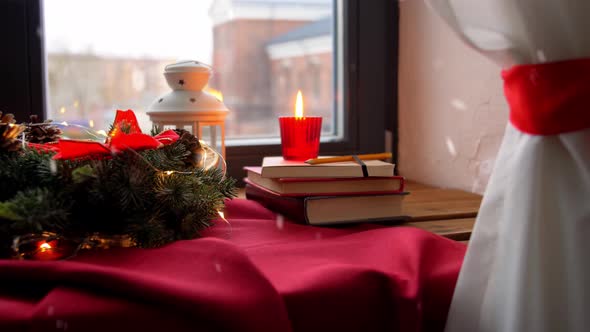 Christmas Wreath Books Candle Lantern on Window