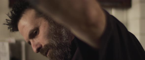 Close up of Italian chef making a pizza. Slow motion. alt