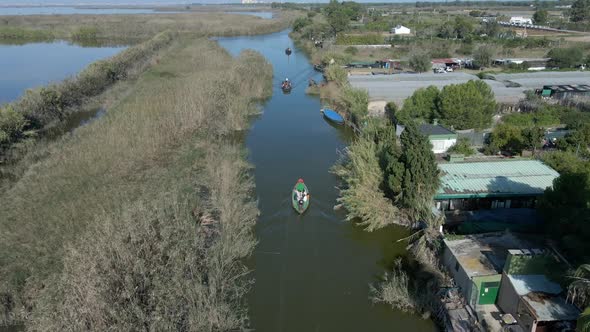 Beautiful Aerial Drone Shot Over a Water Canal and Water Irrigation System Beside a Village in alt