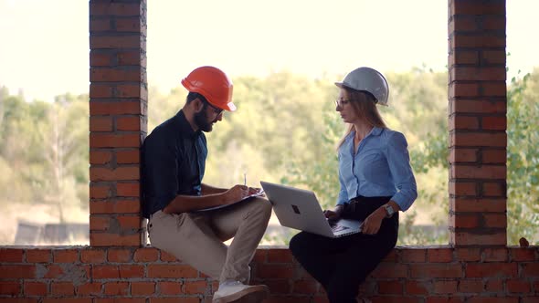 Real Estate Building Project Architect. Builder Constructor Read Blueprints. alt