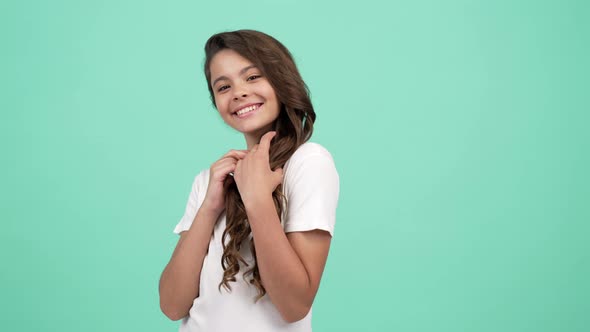 Teen Girl Touch Her Smooth Long Curly Hair with Happy Face Blow Kiss Hairdresser Concept