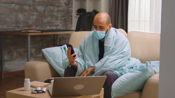 Ill Man During Lockdown on a Video Call with His Doctor alt