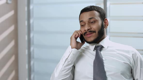 Businessman Talking on the Phone. alt