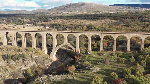 Aerial Train Track On Bridge Sun